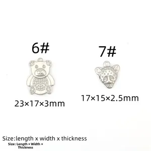 Macro view of stainless steel bear and leopard head charms with detailed dimensions