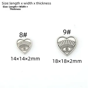 Detailed view of heart-shaped evil eye pendants in two sizes with dimension specifications