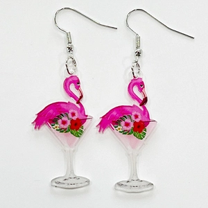 Detail of tropical flamingo cocktail acrylic earrings with pink flowers and silver hooks