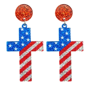 Detail of glitter cross earrings with American flag pattern for Independence Day