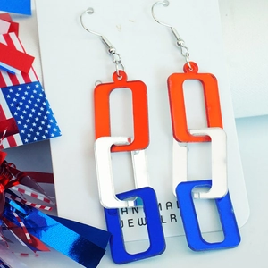 Detail of red white and blue acrylic chain drop earrings for Independence Day decor