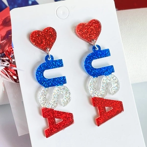 Detail of USA letter earrings with red heart and flag glitter for Independence Day