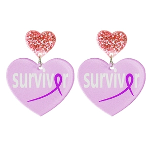 Detail of heart acrylic survivor earrings with purple ribbon and red glitter accents
