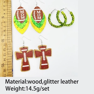 Detailed set of football mom glitter leather earrings and cross wooden drop earrings