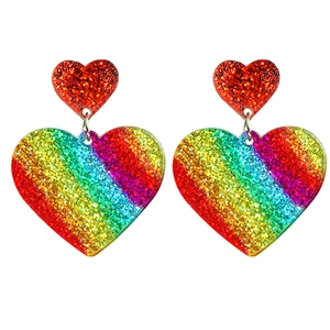 Rainbow striped glitter heart dangle earrings with sparkling red studs on white background