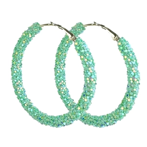 Mint green glitter hoop earrings for women with festive sparkling finish on white background