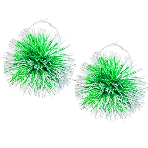 Macro detail of large hoop earrings with green and silver sparkling tinsel balls