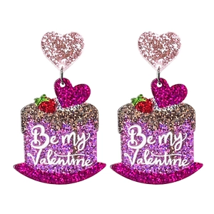Sparkly Valentine cake earrings with pink hearts and 'Be my Valentine' text