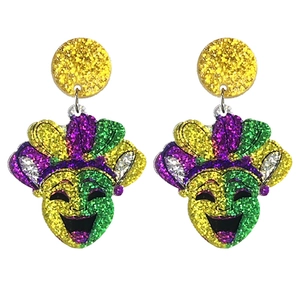 Detailed macro view of Mardi Gras comedy mask earrings with purple, green and gold sequins