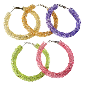 Detailed view of colorful large hoop earrings with sparkly crystal encrusted finish