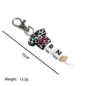Nurse appreciation keychain with Scrub Life silicone charm and RN letter beads 10cm long