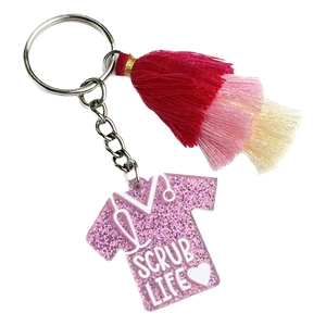 Porte-clés infirmière en acrylique pailleté avec pompon coloré et logo Scrub Life