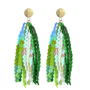Sparkling green sequin tassel drop earrings with golden metal disc for St. Patrick's Day
