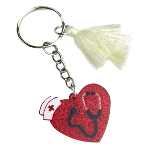 Porte-clés cœur infirmière en acrylique pailleté rouge avec pompon blanc élégant