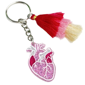 Porte-clés cœur anatomique scintillant avec pompons colorés et anneau argenté