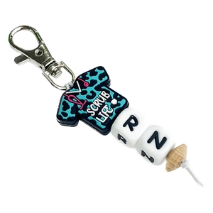 Nurse keychain featuring blue leopard scrub life charm and RN silicone letter beads