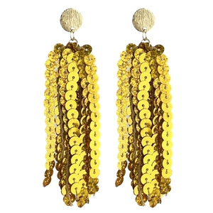 Macro view of gold sequin fringe earrings with shiny round metallic stud base