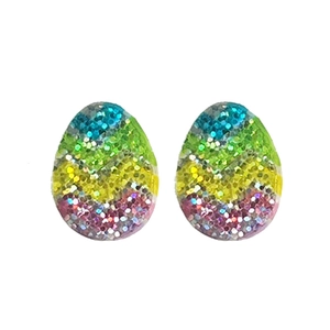 Close-up of rainbow glitter resin Easter egg earrings with colorful zigzag wave patterns