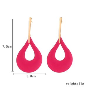 Exaggerated rose red teardrop earrings in matte lacquer finish and hollow design