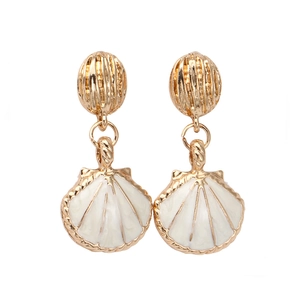 Elegant gold shell drop earrings with white enamel finish and retro ocean style