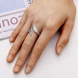 Detailed close-up of adjustable silver leaf ring with intricate leaf veins and texture