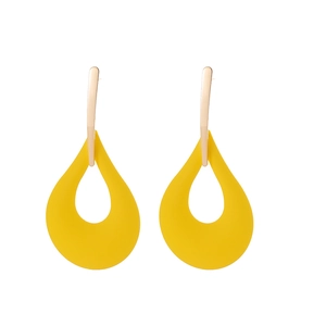 Detail of tear-drop earrings with rose gold metal hooks and yellow hollow pendants