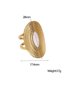 Detail showing dimensions of wide gold ring with white teardrop stone inlay and texture