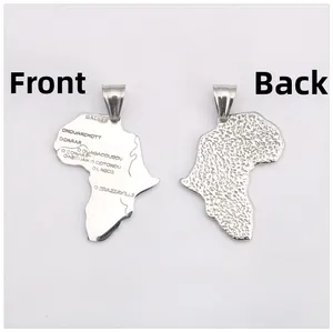 Detailed view of Africa map pendant showing engraved city names and hammered texture back