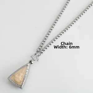 Detail of 6mm stainless steel ball chain and carved Buddhist pendant with S-hook closure
