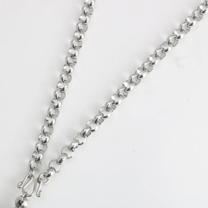 Detailed shot of silver stainless steel rolo chain necklace with a secure S-hook clasp