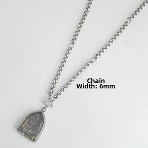 Detail view of 6mm wide stainless steel box chain necklace with engraved amulet pendant