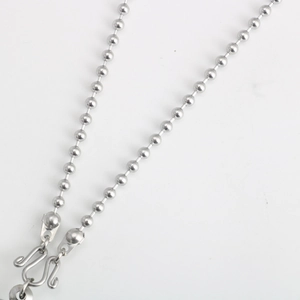 Close-up of silver stainless steel ball chain featuring two M-shaped metal hooks