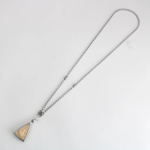 Retro stainless steel necklace with triangular Buddhist carving pendant on white background