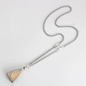 Detail of Thai style triangle amulet pendant with stainless steel box chain and S-hook clasp