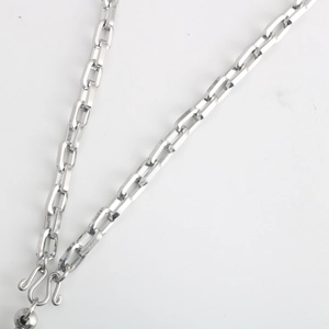 Detail of silver stainless steel rectangular link chain with a double S-hook clasp closure