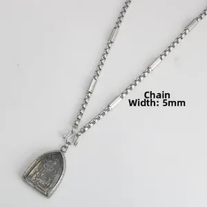 Close-up of a 5mm stainless steel box chain necklace with a Thai Buddha amulet pendant