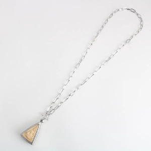 Silver stainless steel chain necklace with an ornate triangular religious relief pendant