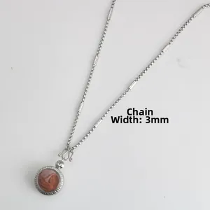 Close-up of 3mm stainless steel bamboo texture chain with Buddhist amulet pendant