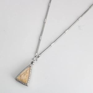 Thai Buddha pendant necklace with silver snake chain and engraved deity design