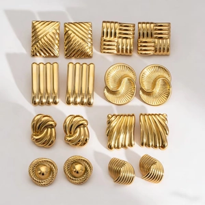 Eight pairs of vintage geometric gold stainless steel earrings with textured patterns