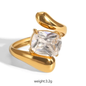 Detail of gold titanium ring with a large rectangular zircon and 3.2g weight marking