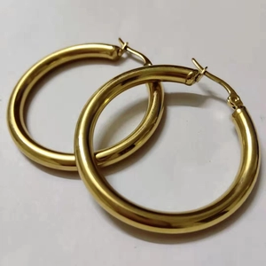 Polished 4mm thick hollow tube gold hoop earrings for women in a minimalist style