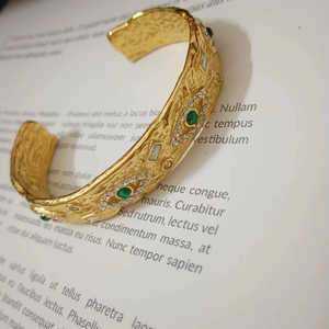 18k gold plated stainless steel open bangle with malachite stones and zircon details