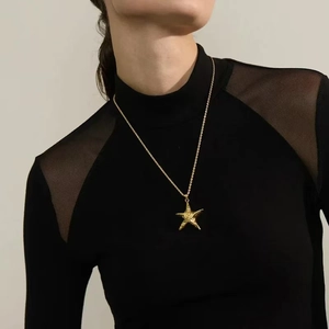 Women's 18K gold plated stainless steel necklace featuring a textured starfish pendant