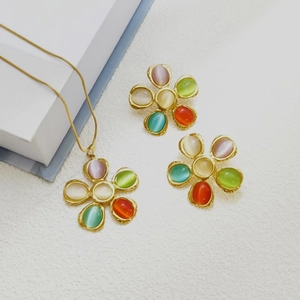 Golden stainless steel necklace and earrings set with colorful cat eye stone flowers