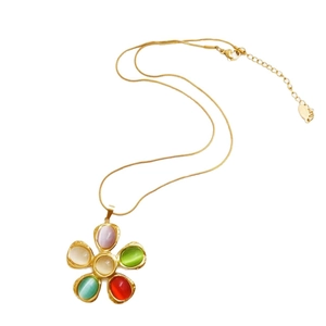 Gold flower necklace with colorful cat eye stone petals on a sleek snake chain
