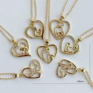 Gold heart-shaped MOM necklace pendant collection featuring mother and child motifs