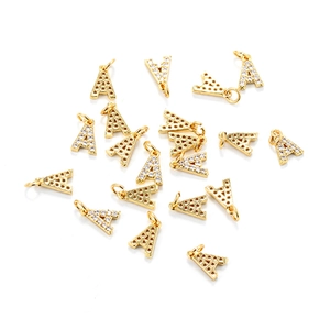 Close-up of gold-plated letter A pendant charms with sparkling white zircon stones