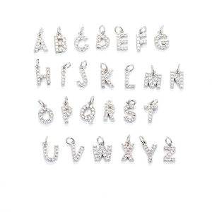 Detailed display of 26 alphabet pendants with micro-pave zircons for necklaces