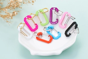 Colorful octagonal carabiner earring charms in shell plate with gold and silver spring gates